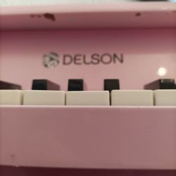 Mini Piano droit de marque DELSON de couleur rose, en bois à partir de 3 ans 